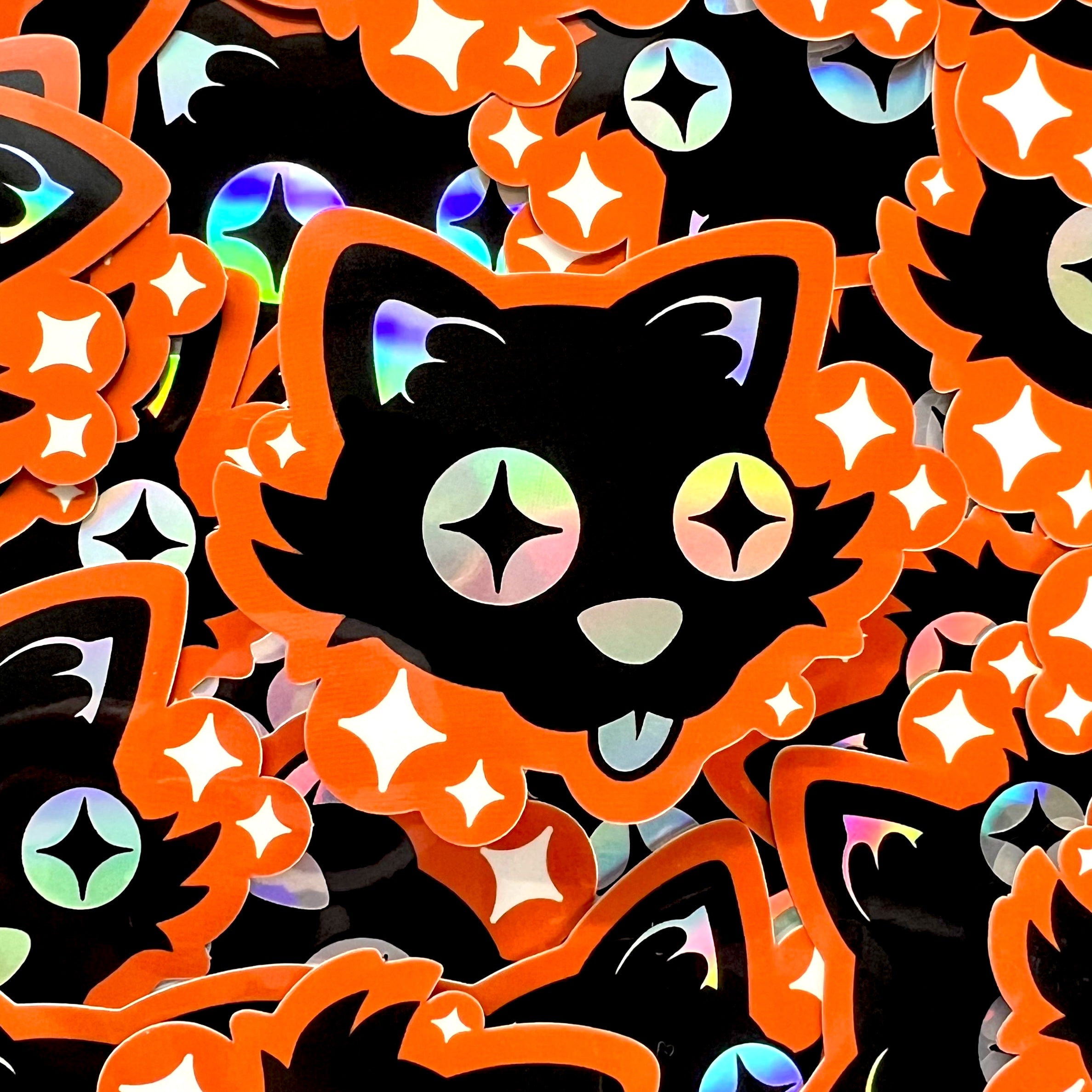 An orange and black sticker of a cartoon black cat sticking its tongue out, with white stars and holographic details.